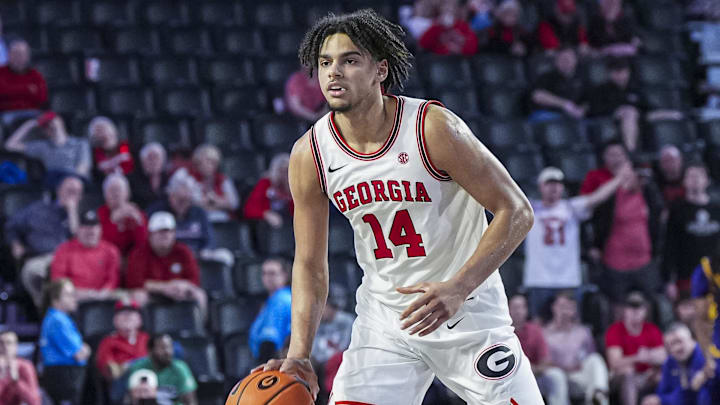 Feb 5, 2025; Athens, Georgia, USA; Georgia Bulldogs forward Asa Newell (14) controls the ball against the LSU Tigers during the second half at Stegeman Coliseum. Feb 5, 2025; Athens, Georgia, USA; Georgia Bulldogs forward Asa Newell (14) controls the ball against the LSU Tigers during the second half at Stegeman Coliseum.