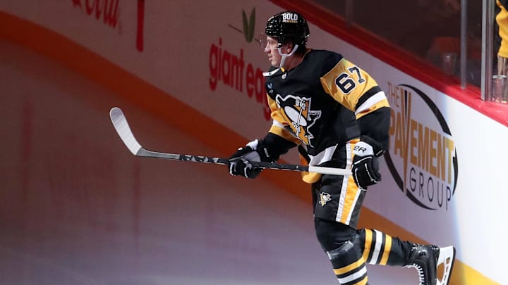 Nov 13, 2024; Pittsburgh, Pennsylvania, USA;  Pittsburgh Penguins right wing Rickard Rakell (67) takes the ice against the Detroit Red Wings at PPG Paints Arena. Mandatory Credit: Charles LeClaire-Imagn Images