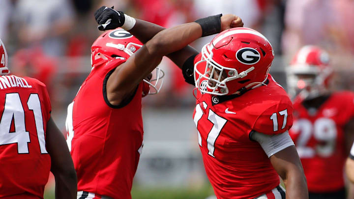 Georgia inside linebacker Nakobe Dean (17) celebrates with Georgia outside linebacker Nolan Smith (4) after getting a sack during the second half of an NCAA college football game between Arkansas and Georgia in Athens, Ga., on Saturday, Oct. 2, 2021. Georgia won 37-0.

News Joshua L Jones

Syndication Online Athens