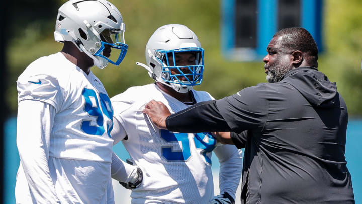 Detroit Lions defensive tackle Brodric Martin (99) talks to defensive line coach Terrell Williams Detroit Lions defensive tackle Brodric Martin (99) talks to defensive line coach Terrell Williams