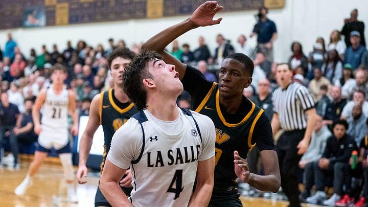 La Salle's Nick Parisi goes for a lay-up against Archbishop Wood's Jaydn Jenkins during their Philadelphia Catholic League boys' basketball game in Wyndmoor on Thursday, Feb. 6, 2025.
