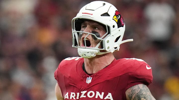 Arizona Cardinals tight end Trey McBride (85) yells out after making a first-down catch against the Carolina Panthers at State Farm Stadium on Sept 14, 2025.