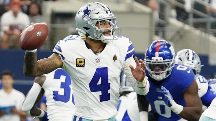 Dallas Cowboys quarterback Dak Prescott looks to pass the ball against the New York Giants at AT&T Stadium. 
