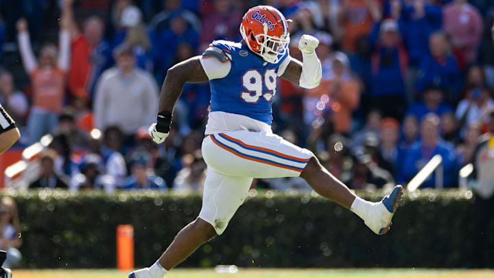 Florida Gators defensive lineman Cam Jackson celebrates after a sack against the Mississippi Rebels during the first half at Ben Hill Griffin Stadium. Florida Gators defensive lineman Cam Jackson celebrates after a sack against the Mississippi Rebels during the first half at Ben Hill Griffin Stadium.
