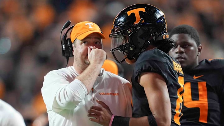 Tennessee head coach Josh Heupel talks to Tennessee quarterback Nico Iamaleava (8) on the sideline during a game between Tennessee and Kentucky at Neyland Stadium in Knoxville, Tenn., Saturday, Nov. 2, 2024.