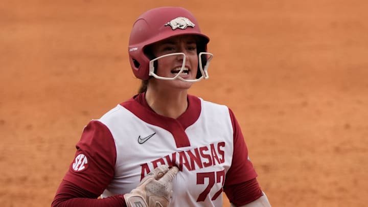 Arkansas infielder Bri Ellis (77) celebrates after hitting a walkout grand slam to win the game during a SEC softball tournament second round game against Georgia in Athens, Ga., on Wednesday, May 7, 2025. Arkansas won 5-1.