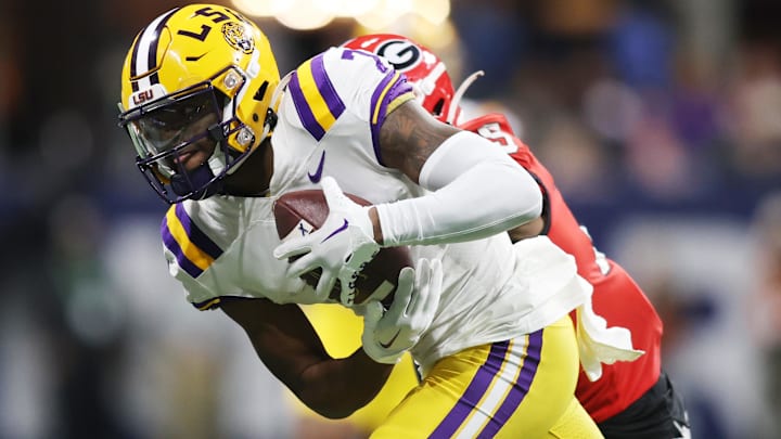 Dec 3, 2022; Atlanta, GA, USA; LSU Tigers wide receiver Kayshon Boutte (7) carries the ball