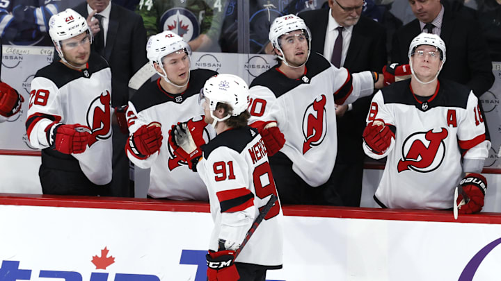 Nov 14, 2023; Winnipeg, Manitoba, CAN; New Jersey Devils center Dawson Mercer (91) celebrates his third period goal against the Winnipeg Jets at Canada Life Centre. Mandatory Credit: James Carey Lauder-Imagn Images Nov 14, 2023; Winnipeg, Manitoba, CAN; New Jersey Devils center Dawson Mercer (91) celebrates his third period goal against the Winnipeg Jets at Canada Life Centre. Mandatory Credit: James Carey Lauder-Imagn Images