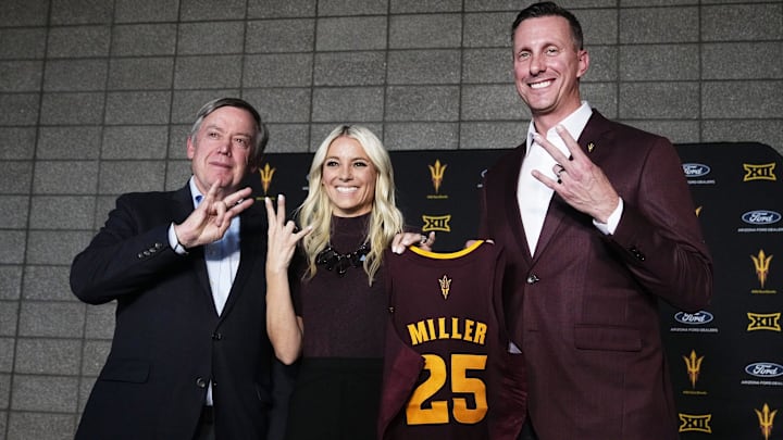 ASU president Michael M. Crow, new women's basketball head coach Molly Miller, and athletic director Graham Rossini (right) during a news conference at Papago Golf Club in Phoenix on March 26, 2025.