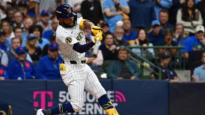 Oct 2, 2024; Milwaukee, Wisconsin, USA; Milwaukee Brewers outfielder Jackson Chourio (11) hits a home run during the eighth inning in game two of the Wildcard round for the 2024 MLB Playoffs against the New York Mets at American Family Field. Mandatory Credit: Benny Sieu-Imagn Images