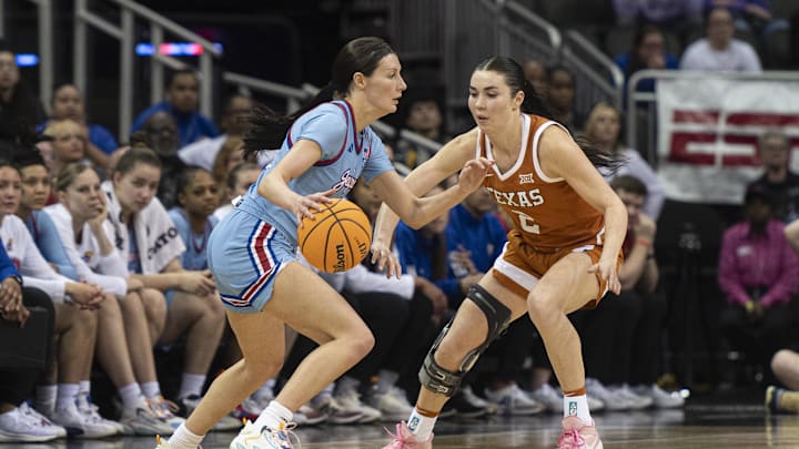Mar 9, 2024; Kansas City, MO, USA; Kansas Jayhawks guard Holly Kersgieter (13) handles the ball against Texas in the Big 12 Tournament