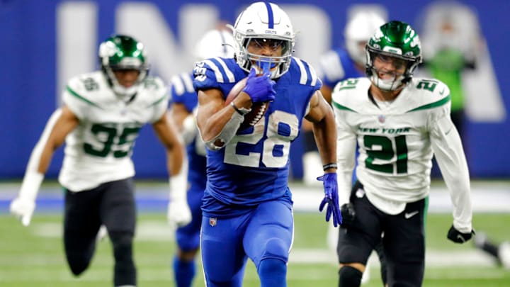 Indianapolis Colts running back Jonathan Taylor (28) rushes 78 yards for a touchdown Thursday, Nov. 4, 2021, during a game against the New York Jets at Lucas Oil Stadium in Indianapolis.