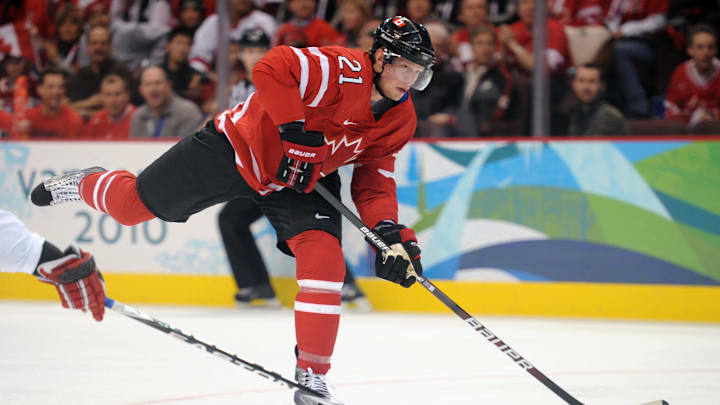 February 16, 2010; Vancouver, BC, CANADA; Canada forward Eric Staal (21) shoots the puck in the first period against Norway during the preliminary round of group A play of the 2010 Vancouver Olympics at the Canada Hockey Place. Mandatory Credit: Kyle Terada-Imagn Images