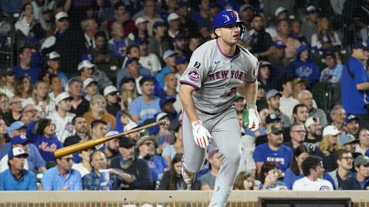 Sep 23, 2025; Chicago, Illinois, USA; New York Mets first baseman Pete Alonso (20) hits a RBI single against the Chicago Cubs during the sixth inning at Wrigley Field. Mandatory Credit: David Banks-Imagn Images Sep 23, 2025; Chicago, Illinois, USA; New York Mets first baseman Pete Alonso (20) hits a RBI single against the Chicago Cubs during the sixth inning at Wrigley Field. Mandatory Credit: David Banks-Imagn Images