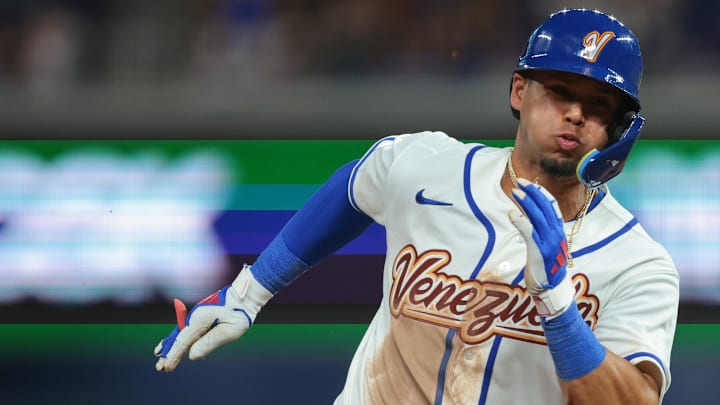 Mar 7, 2026; Miami, FL, United States; Venezuela shortstop Ezequiel Tovar (14) rounds past third base against Israel during the sixth inning at loanDepot Park. Mandatory Credit: Sam Navarro-Imagn Images