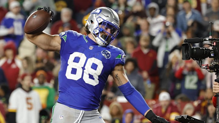 Nov 2, 2025; Landover, Maryland, USA; Seattle Seahawks tight end AJ Barner (88) celebrates scoring a touchdown against the Washington Commanders during the second half at Northwest Stadium. Mandatory Credit: Amber Searls-Imagn Images