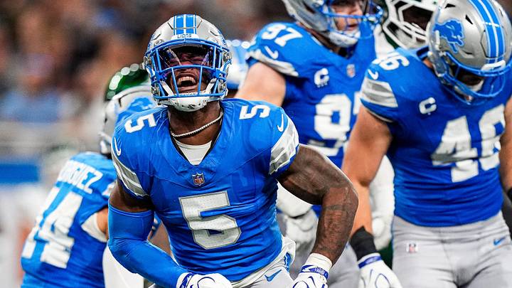 Detroit Lions defensive back Christian Izien (5) celebrates a play against New York Jets during the first half at Ford Field in Detroit on Sunday, Sept. 27, 2026.