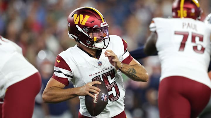 Aug 8, 2025; Foxborough, Massachusetts, USA; Washington Commanders quarterback Sam Hartman (15) drops back to pass during the first half against the New England Patriots at Gillette Stadium. Mandatory Credit: Paul Rutherford-Imagn Images Aug 8, 2025; Foxborough, Massachusetts, USA; Washington Commanders quarterback Sam Hartman (15) drops back to pass during the first half against the New England Patriots at Gillette Stadium. Mandatory Credit: Paul Rutherford-Imagn Images