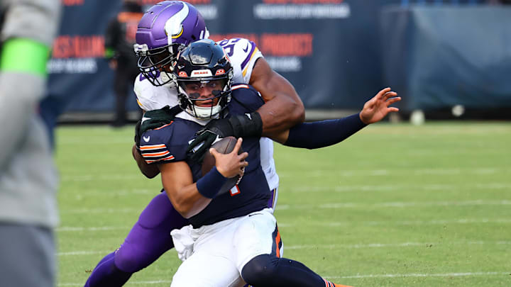 Oct 15, 2023; Chicago, Illinois, USA; Minnesota Vikings linebacker Danielle Hunter (99) tackles Justin Fields.