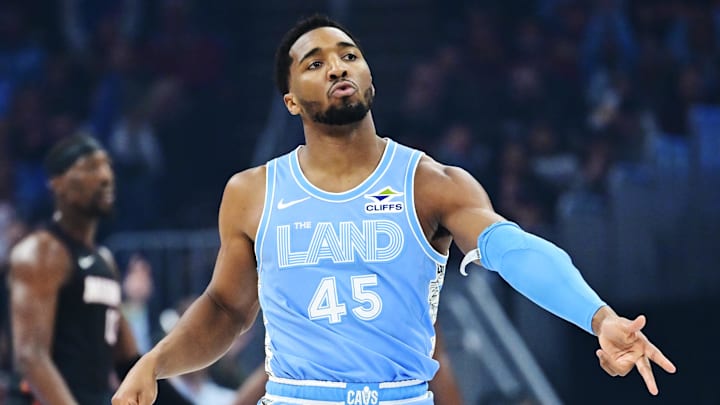 Mar 5, 2025; Cleveland, Ohio, USA; Cleveland Cavaliers guard Donovan Mitchell (45) celebrates after hitting a three point basket during the first half against the Miami Heat at Rocket Arena. Mandatory Credit: Ken Blaze-Imagn Images