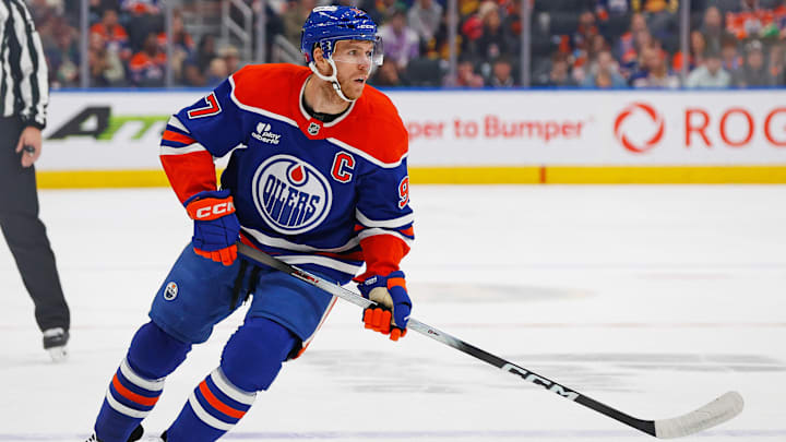 Sep 28, 2025; Edmonton, Alberta, CAN; Edmonton Oilers forward Connor McDavid (97) follows the play against the Vancouver Canucks at Rogers Place. Mandatory Credit: Perry Nelson-Imagn Images
