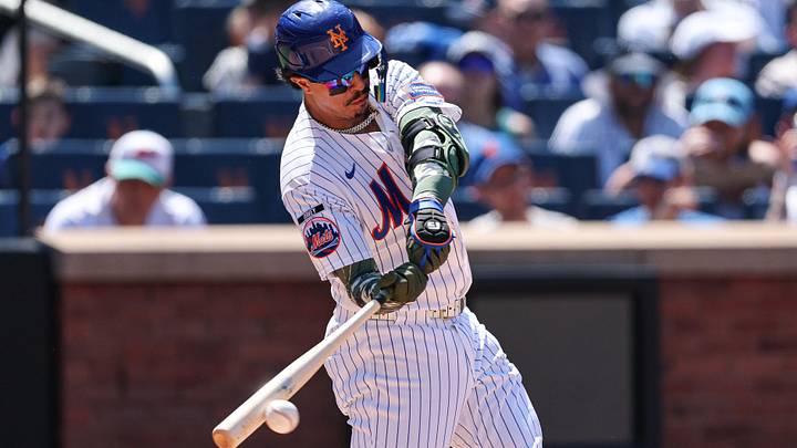 May 17, 2026; New York City, New York, USA; New York Mets first baseman Mark Vientos (27) singles during the fourth inning against the New York Yankees at Citi Field. Mandatory Credit: Vincent Carchietta-Imagn Images