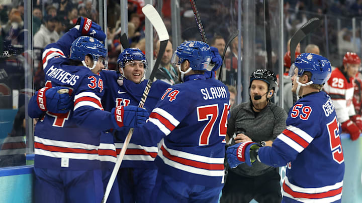 Feb 14, 2026; Milan, Italy; Matt Boldy of United States celebrates scoring their first goal with teammates against Denmark in men's ice hockey group C play during the Milano Cortina 2026 Olympic Winter Games at Milano Santagiulia Ice Hockey Arena. Mandatory Credit: Geoff Burke-Imagn Images Feb 14, 2026; Milan, Italy; Matt Boldy of United States celebrates scoring their first goal with teammates against Denmark in men's ice hockey group C play during the Milano Cortina 2026 Olympic Winter Games at Milano Santagiulia Ice Hockey Arena. Mandatory Credit: Geoff Burke-Imagn Images