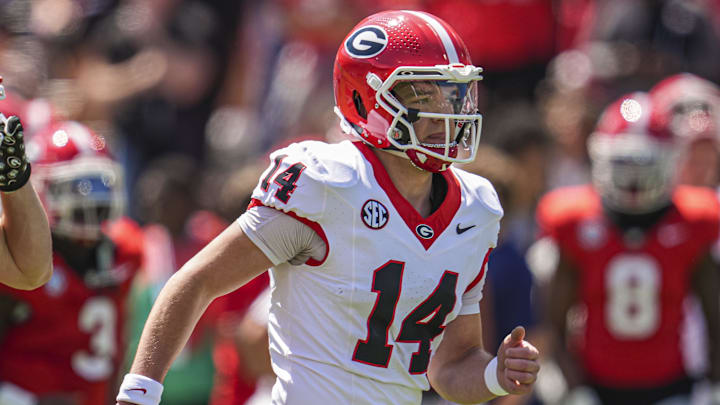 Apr 12, 2025; Athens, GA, USA; Georgia Bulldogs quarterback Gunner Stockton (14) runs on the field prior to the start of the Georgia Spring game at Sanford Stadium. Mandatory Credit: Dale Zanine-Imagn Images Apr 12, 2025; Athens, GA, USA; Georgia Bulldogs quarterback Gunner Stockton (14) runs on the field prior to the start of the Georgia Spring game at Sanford Stadium. Mandatory Credit: Dale Zanine-Imagn Images