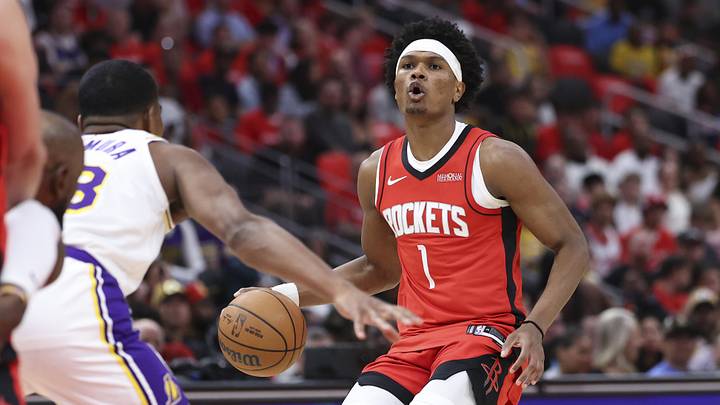 Apr 26, 2026; Houston, Texas, USA; Houston Rockets guard/forward Amen Thompson (1) dribbles the ball during the first quarter against the Los Angeles Lakers during game four of the first round of the 2026 NBA Playoffs at Toyota Center. Mandatory Credit: Troy Taormina-Imagn Images