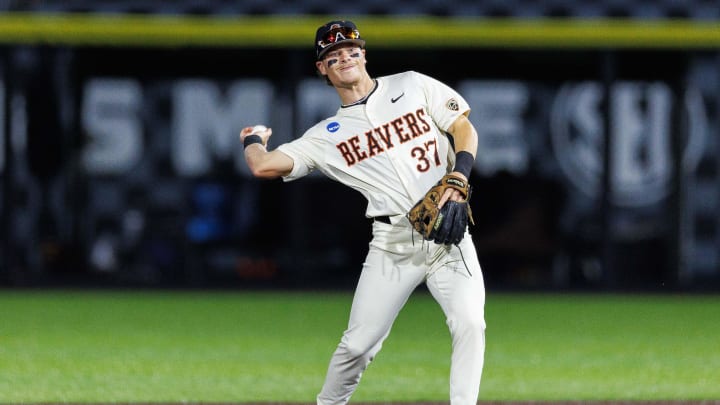Jun 9, 2024; Lexington, KY, USA; Oregon State Beavers infielder Travis Bazzana (37) throws the ball during the second inning against the Kentucky Wildcats at Kentucky Proud Park. Mandatory Credit: Jordan Prather-USA TODAY Sports Jun 9, 2024; Lexington, KY, USA; Oregon State Beavers infielder Travis Bazzana (37) throws the ball during the second inning against the Kentucky Wildcats at Kentucky Proud Park. Mandatory Credit: Jordan Prather-USA TODAY Sports