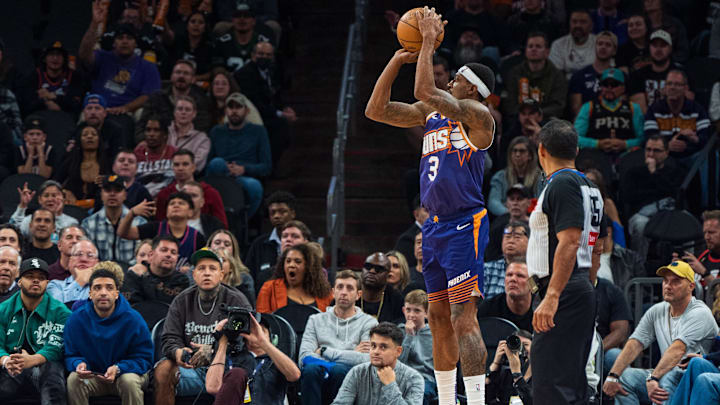 Nov 10, 2024; Phoenix, Arizona, USA; Phoenix Suns guard Bradley Beal (3) shoots from the corner during overtime during a game against the Sacramento Kings at Footprint Center. Mandatory Credit: Allan Henry-Imagn Images