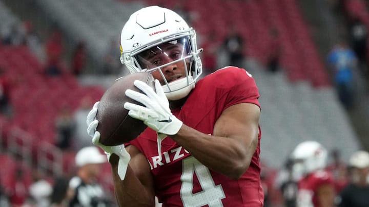Arizona Cardinals receiver Rondale Moore (4) warms up before their game against the Atlanta Falcons at State Farm Stadium on Nov. 12, 2023, in Glendale.