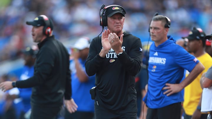 Kansas Jayhawks head coach Lance Leipold applauds on the sidelines during the first half of the game against West Virginia Mountaineers at David Booth Kansas Memorial Stadium on Sept. 20, 2025. Kansas Jayhawks head coach Lance Leipold applauds on the sidelines during the first half of the game against West Virginia Mountaineers at David Booth Kansas Memorial Stadium on Sept. 20, 2025.