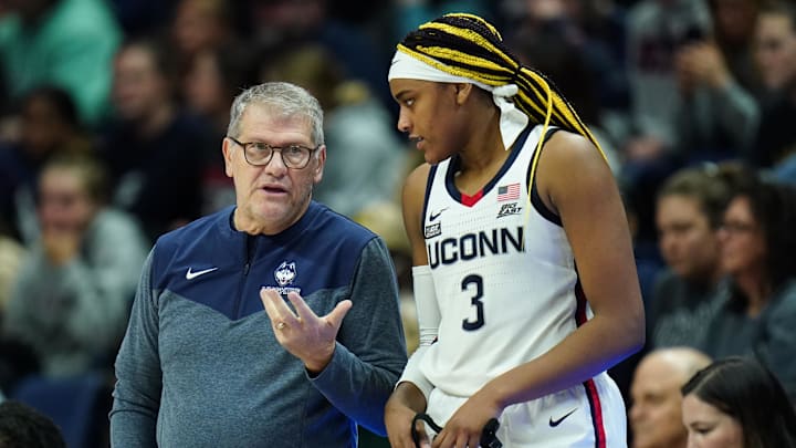 Jan 21, 2023; Storrs, Connecticut, USA; UConn Huskies head coach Geno Auriemma talks with forward Aaliyah Edwards (3) from the sideline as they take on the Butler Bulldogs at Harry A. Gampel Pavilion. Mandatory Credit: David Butler II-Imagn Images