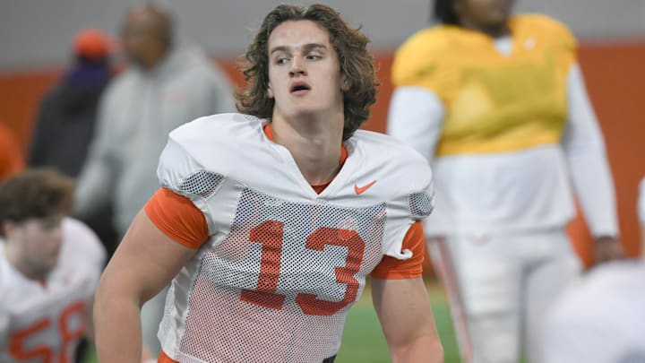 Clemson defensive end Will Heldt (13) stretches during the football practice at the Allen N. Reeves Football Complex at Clemson University in Clemson, S.C. Wednesday, March 5, 2025.