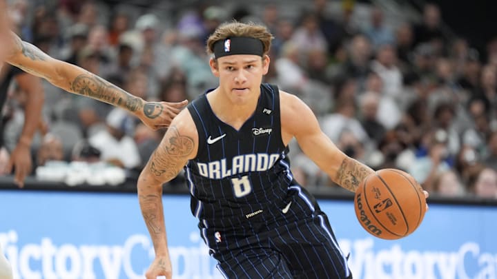 Oct 9, 2024; San Antonio, Texas, USA;  Orlando Magic guard Mac McClung (8) dribbles in the second half against the San Antonio Spurs at Frost Bank Center. Mandatory Credit: Daniel Dunn-Imagn Images