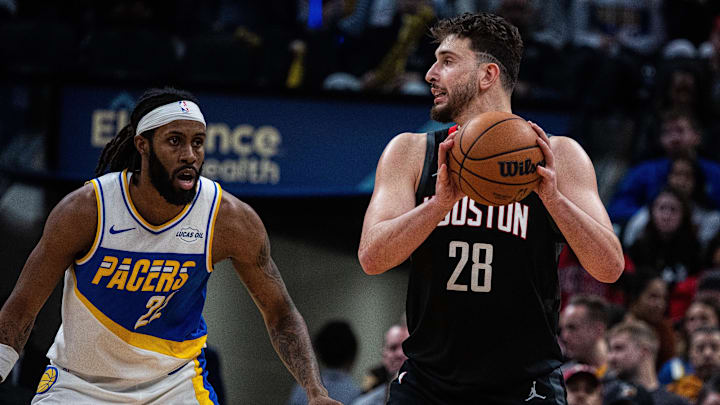 Feb 2, 2026; Indianapolis, Indiana, USA;  Houston Rockets center Alperen Sengun (28) holds  the ball while Indiana Pacers forward Isaiah Jackson (22)  defends in the second half at Gainbridge Fieldhouse. Mandatory Credit: Trevor Ruszkowski-Imagn Images