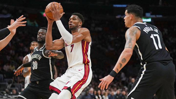 Oct 14, 2026; Miami, Florida, USA; Miami Heat forward Giannis Antetokounmpo (7) goes up for a shot as Brooklyn Nets forward Julius Randle (30) and forward Michael Porter Jr. (17) defend during the second half at Kaseya Center. Mandatory Credit: Jim Rassol-Imagn Images Oct 14, 2026; Miami, Florida, USA; Miami Heat forward Giannis Antetokounmpo (7) goes up for a shot as Brooklyn Nets forward Julius Randle (30) and forward Michael Porter Jr. (17) defend during the second half at Kaseya Center. Mandatory Credit: Jim Rassol-Imagn Images