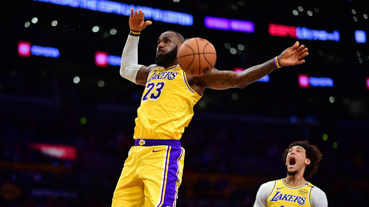 January 15, 2025; Los Angeles, California, USA; Los Angeles Lakers forward LeBron James (23) scores a basket against the Miami Heat as center Jaxson Hayes (11) reacts during the second half at Crypto.com Arena. Mandatory Credit: Gary A. Vasquez-Imagn Images