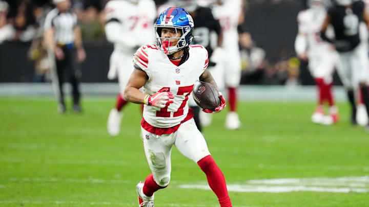 New York Giants wide receiver Wan'Dale Robinson (17) runs with the ball after a catch in the second quarter against the Las Vegas Raiders at Allegiant Stadium.  