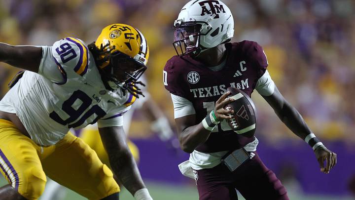 Sep 26, 2026; Baton Rouge, Louisiana, USA; LSU Tigers defensive tackle Stephiylan Green (90) pressures Texas A&M Aggies quarterback Marcel Reed (10) during the third quarter at Tiger Stadium. Mandatory Credit: Stephen Lew-Imagn Images Sep 26, 2026; Baton Rouge, Louisiana, USA; LSU Tigers defensive tackle Stephiylan Green (90) pressures Texas A&M Aggies quarterback Marcel Reed (10) during the third quarter at Tiger Stadium. Mandatory Credit: Stephen Lew-Imagn Images