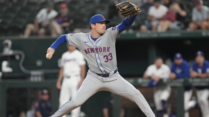 Jun 17, 2024; Arlington, Texas, USA; New York Mets relief pitcher Drew Smith (33) delivers a pitch to the Texas Rangers during the ninth inning at Globe Life Field. Mandatory Credit: Jim Cowsert-USA TODAY Sports