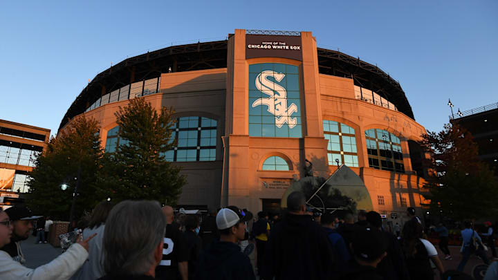 Chicago, IL, USA; Fans walk outside as the sun sets prior to a game between the Chicago White Sox and the Los Angeles Angels at Guaranteed Rate Field. Mandatory Credit: Patrick Gorski-Imagn Images