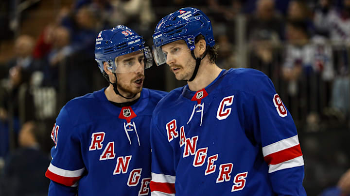 Nov 25, 2024; New York, New York, USA; New York Rangers right wing Reilly Smith (91) talks with defenseman Jacob Trouba (8) during a timeout against the St. Louis Blues during the first period at Madison Square Garden. Mandatory Credit: Danny Wild-Imagn Images Nov 25, 2024; New York, New York, USA; New York Rangers right wing Reilly Smith (91) talks with defenseman Jacob Trouba (8) during a timeout against the St. Louis Blues during the first period at Madison Square Garden. Mandatory Credit: Danny Wild-Imagn Images