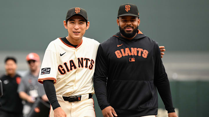 San Francisco Giants center fielder Jung Hoo Lee (51) and left fielder Heliot Ramos.