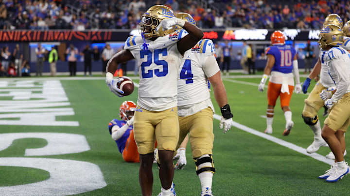 Dec 16, 2023; Inglewood, CA, USA; UCLA Bruins running back TJ Harden (25) reacts after scoring a
