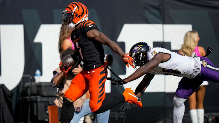 Cincinnati Bengals wide receiver Ja'Marr Chase (1) breaks away to run a reception down field for a touchdown in the fourth quarter of the NFL Week 5 game between the Cincinnati Bengals and Baltimore Ravens at Paycor Stadium in downtown Cincinnati on Sunday, Oct. 6, 2024. The Bengals fell to 1-4 on the season with a 41-38 loss to the Ravens.