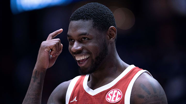Oklahoma Sooners guard Duke Miles (15) reacts to his late-game play against the Georgia Bulldogs during their first round game of the SEC Men's Basketball Tournament at Bridgestone Arena in Nashville, Tenn., Wednesday, March 12, 2025. Instead of grabbing the ball that was rolling toward their goal, Miles let it go and forced the Georgia Bulldogs player to grab it for a backcourt violation.
