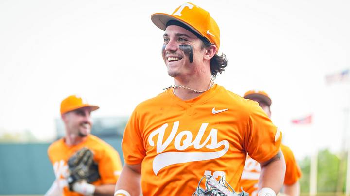Tennessee's Reese Chapman (13) smiles as he runs back to the dugout after making a catch at the wall during a college baseball game between Tennessee and LSU at Lindsey Nelson Stadium in Knoxville, Tennessee., on April 3, 2026. Tennessee's Reese Chapman (13) smiles as he runs back to the dugout after making a catch at the wall during a college baseball game between Tennessee and LSU at Lindsey Nelson Stadium in Knoxville, Tennessee., on April 3, 2026.