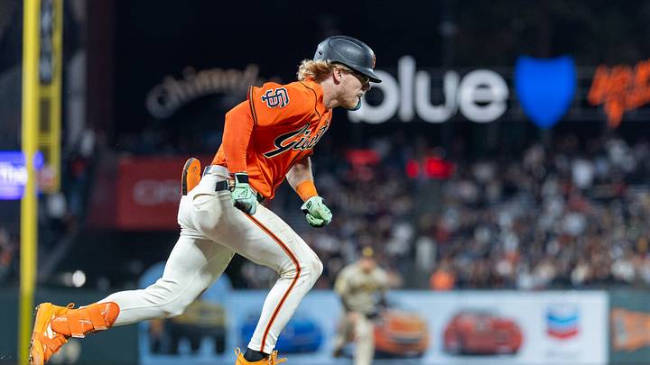 Sep 11, 2026; San Francisco, California, USA;  San Francisco Giants center fielder Jonah Cox (53) bunts to get on first base during the ninth inning against the San Diego Padres at Oracle Park.  Mandatory Credit: Bob Kupbens-Imagn Images